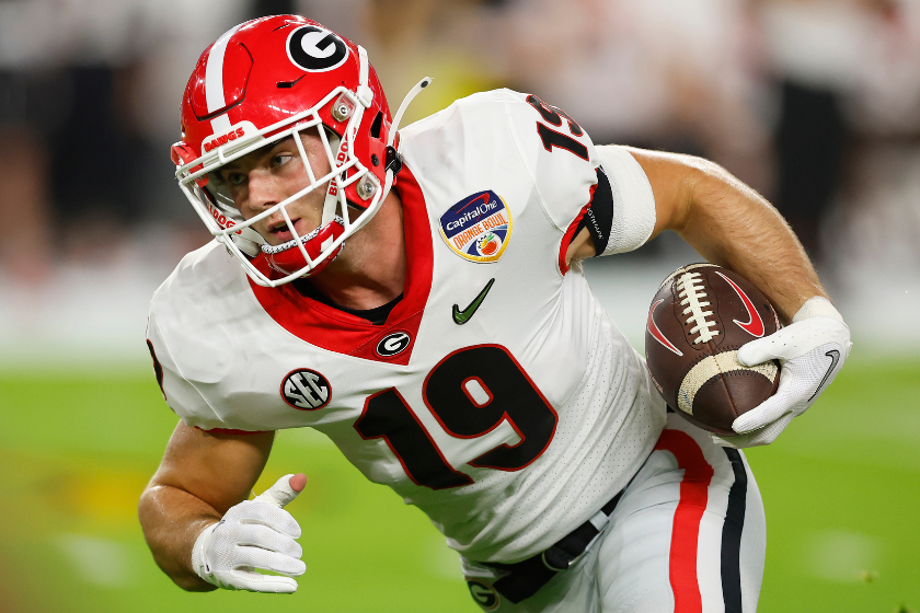 Brock Bowers #19 of the Georgia Bulldogs warms up prior to the game against the Michigan Wolverines in the Capital One Orange Bowl