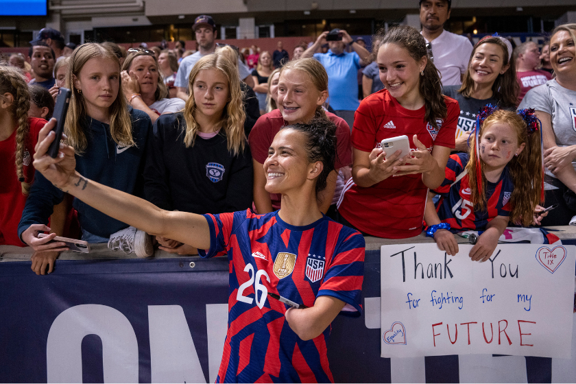 Carson Pickett #26 of the United States takes a selfie with fans during a game between Colombia and USWNT