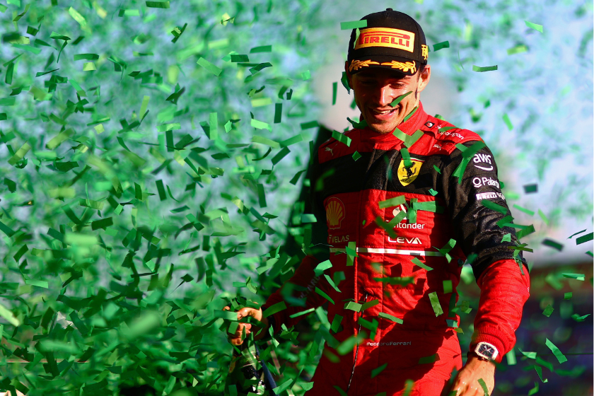 Race winner Charles Leclerc of Monaco and Ferrari celebrates on the podium after the F1 Grand Prix of Australia at Melbourne Grand Prix Circuit