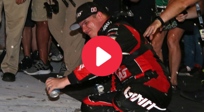 Cole Custer falls off car after celebrating Alsco 300 win at Kentucky Speedway on July 12, 2019