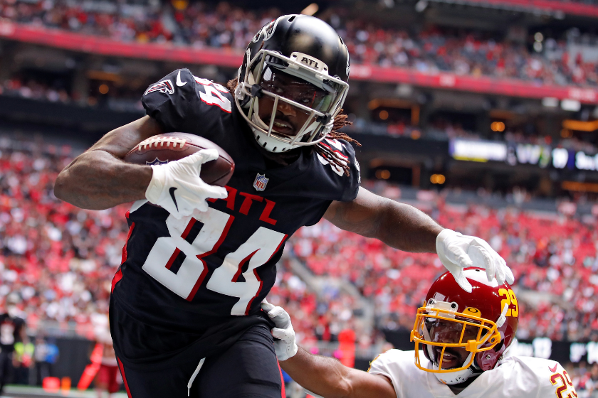 Cordarrelle Patterson #84 of the Atlanta Falcons scores a touchdown reception against Kendall Fuller #29 of the Washington Football Team