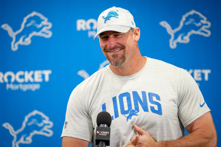 Dan Campbell at the podium during training camp for the Detroit Lions.
