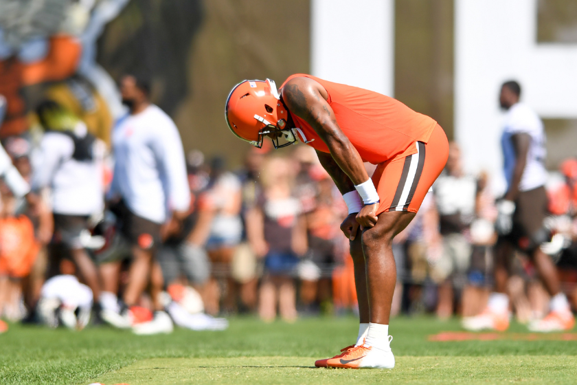 Deshaun Watson #4 of the Cleveland Browns rests after running a drill during Cleveland Browns training camp