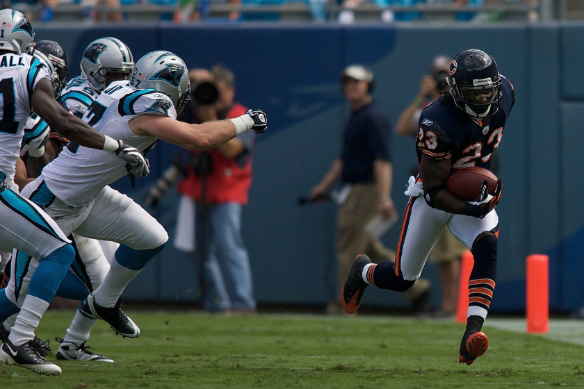 Devin Hester #23 of the Chicago Bears returns the kick against the Carolina Panthers 