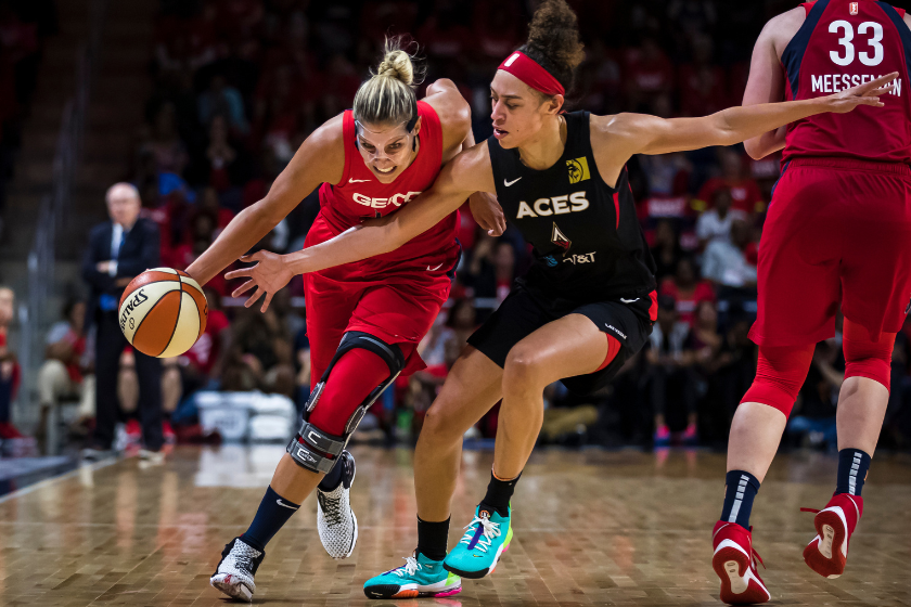 Elena Delle Donne #11 of the Washington Mystics dribbles the ball against Dearica Hamby #5 of the Las Vegas Aces during the second half of Game One of the 2019 WNBA playoffs