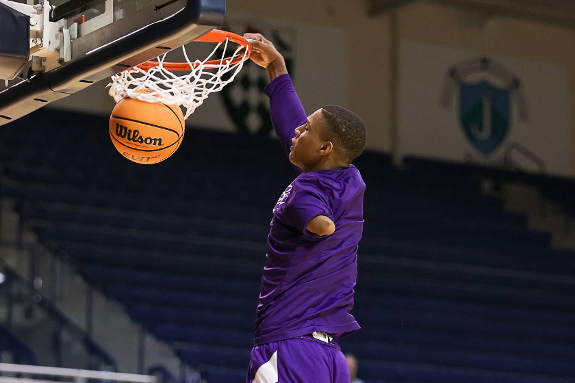 Hansel Enmanuel #24 of the Northwestern State Demons, known to social media as the one armed basketball player, warms up before a game against the Rice Owls at Tudor Fieldhouse