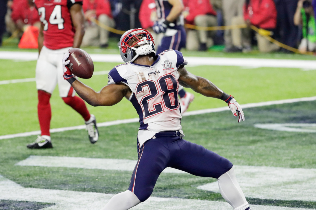 James White #28 of the New England Patriots celebrates rushing for a 1-yard touchdown in the fourth quarter against the Atlanta Falcons during Super Bowl 51