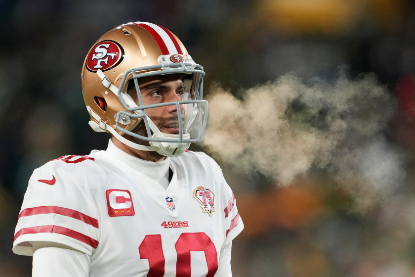 Quarterback Jimmy Garoppolo #10 of the San Francisco 49ers warms up prior to the 2022 NFC Divisional Playoff game
