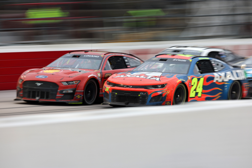 Joey Logano and William Byron race during the 2022 Goodyear 400 at Darlington Raceway