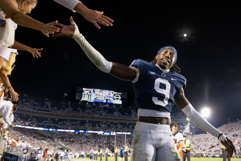 Joey Porter Jr. #9 of the Penn State Nittany Lions celebrates with fans after the game against the Auburn Tigers