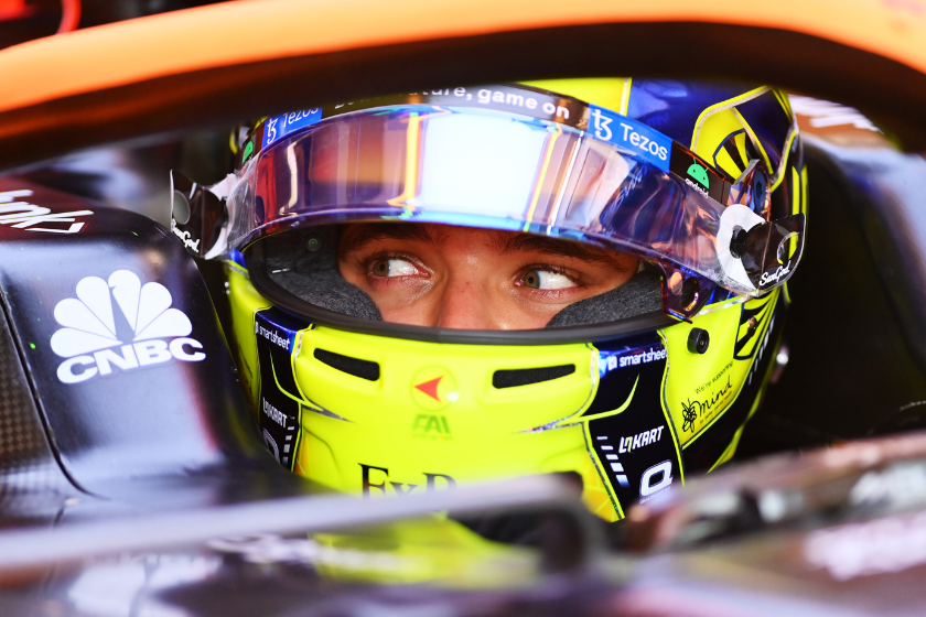 Lando Norris of Great Britain and McLaren prepares to drive in the garage during practice ahead of the F1 Grand Prix of Hungary at Hungaroring