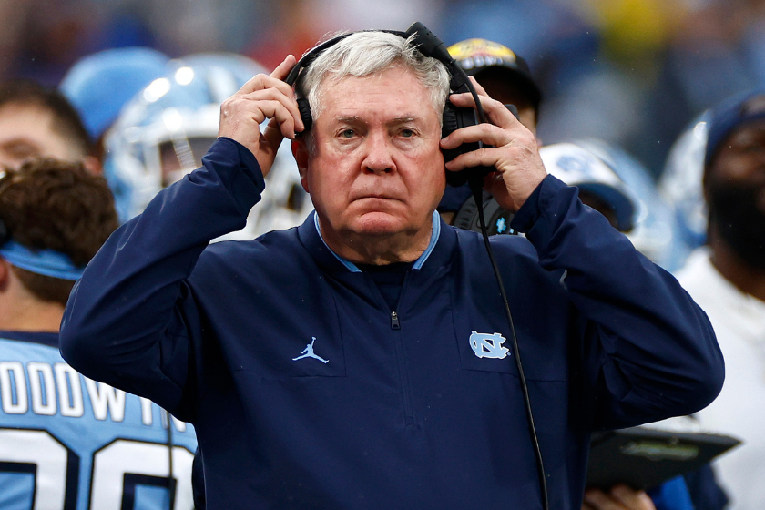 Head coach Mack Brown of the North Carolina Tar Heels looks on during the first half of the Duke's Mayo Bowl against the South Carolina Gamecocks at Bank of America Stadium