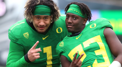 Noah Sewell #1 and Verone McKinley III #23 of the Oregon Ducks pose during the Oregon spring game