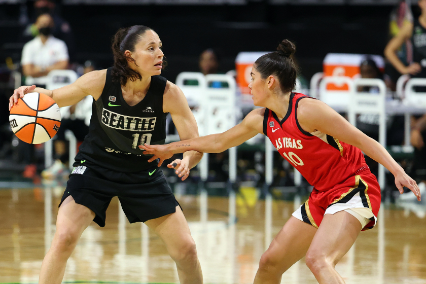 Sue Bird #10 of the Seattle Storm handles the ball against Kelsey Plum #10 of the Las Vegas Aces during the fourth quarter at Angel of the Winds Arena