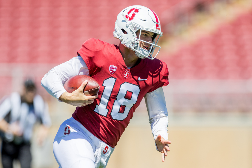Stanford Cardinal quarterback Tanner McKee (18) scrambles during the Stanford college football Cardinal & White Spring Game