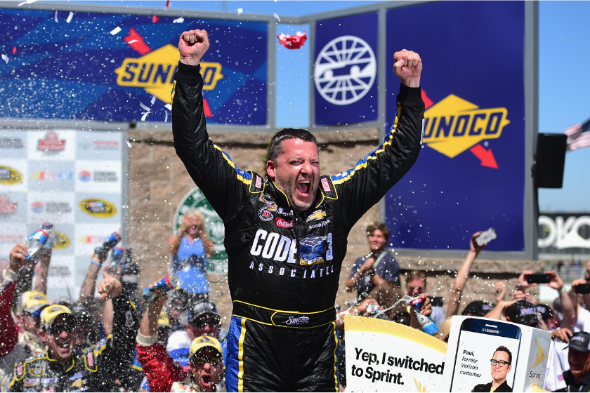Tony Stewart celebrates in victory lane after winning the NASCAR Sprint Cup Series ToyotaSave Mart 350 at Sonoma Raceway on June 26, 2016