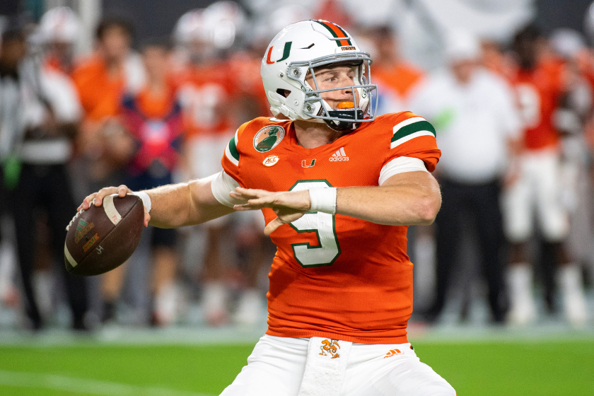Miami quarterback Tyler Van Dyke (9) throws the ball during the college football game between the Virginia Cavaliers and the University of Miami Hurricanes