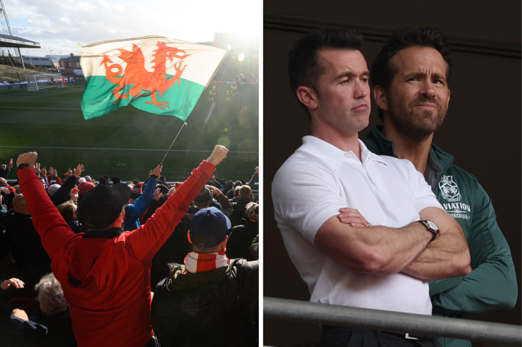 Supporters celebrate Wrexham Association Football Club's first goal during a National League fixture football match against Maidenhead United, at the Racecourse Ground stadium, Wrexham owners Rob McElhenney (left) and Ryan Reynolds during the Buildbase FA Trophy Final