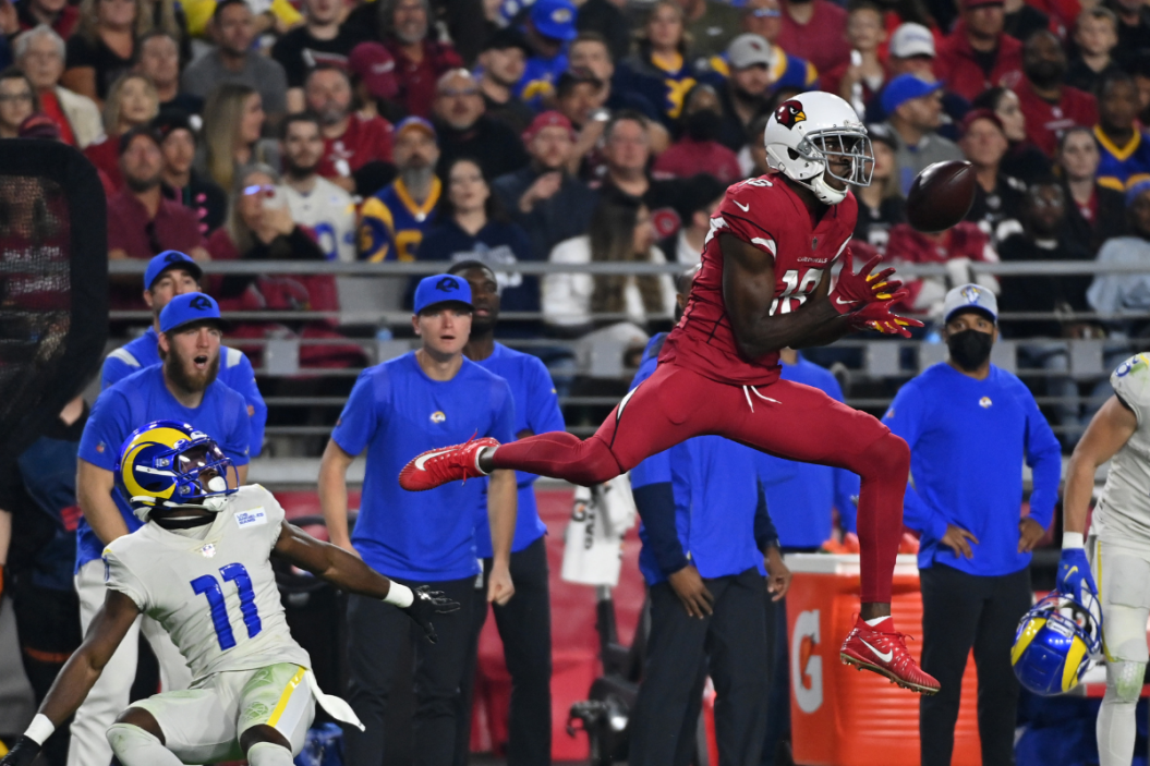 AJ Green #18 of the Arizona Cardinals makes a leaping catch against the Los Angeles Rams