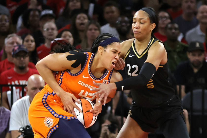  A'ja Wilson #22 of the Las Vegas Aces knocks the ball away from Brionna Jones #42 of the Connecticut Sun in the fourth quarter of Game One of the 2022 WNBA Playoffs finals