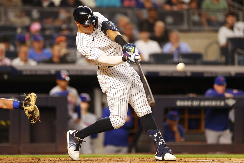 Aaron Judge #99 of the New York Yankees hits a home run during the third inning against the New York Mets
