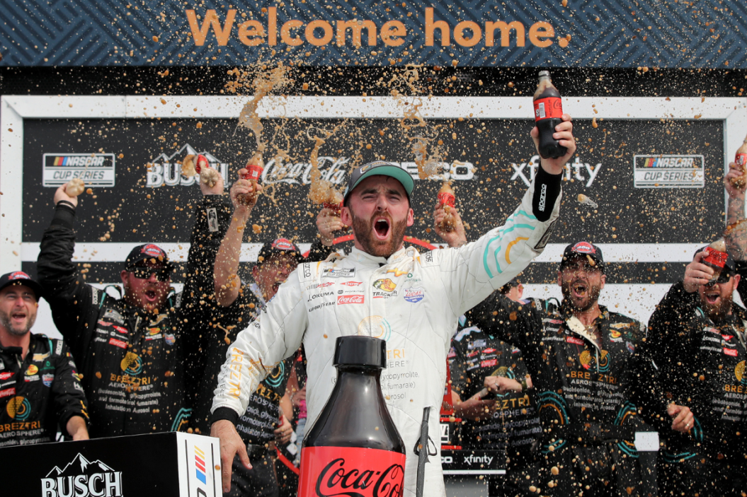 Austin Dillon celebrates in the Ruoff Mortgage victory lane after winning the 2022 Coke Zero Sugar 400 at Daytona International Speedway