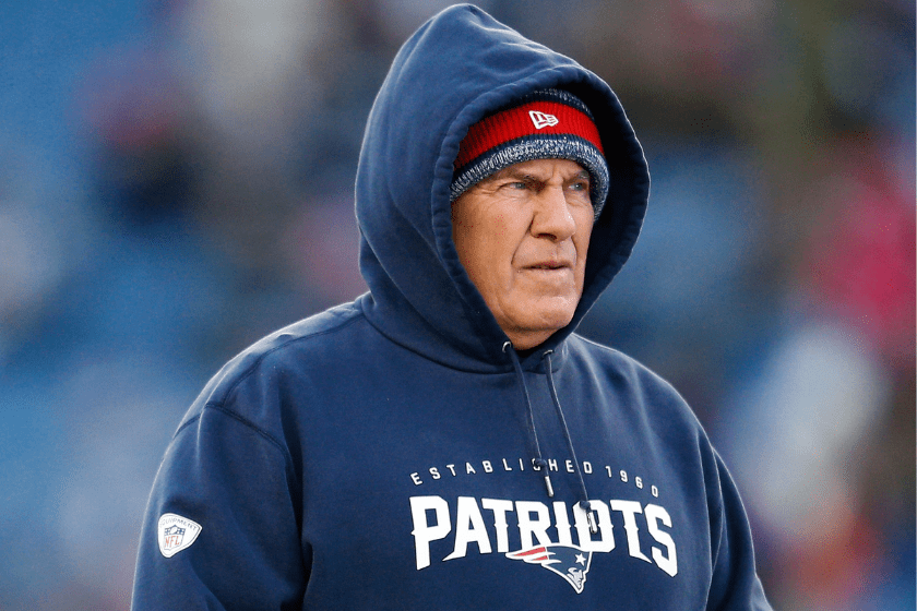 Head coach Bill Belichick of the New England Patriots looks on during warm ups before the 2014 AFC Divisional Playoffs game against the Baltimore Ravens