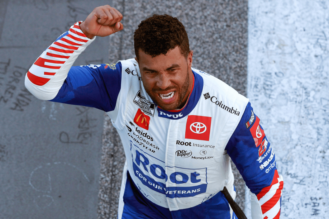 Bubba Wallace celebrates after winning the 2022 Hollywood Casino 400 at Kansas Speedway