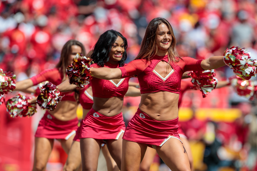 Kansas City Chiefs cheerleaders perform at a preseason game against the Washington Commanders.