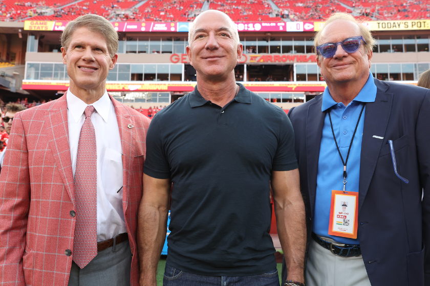 Kansas City Chiefs Owner Clark Hunt, Former Amazon CEO Jeff Bezos, and Los Angeles Chargers Owner Dean Spanos on the field before the game at Arrowhead Stadium
