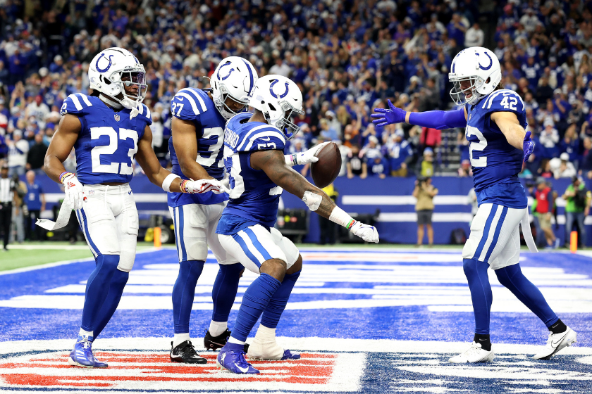 Darius Leonard #53 of the Indianapolis Colts celebrates his interception with teammates during the second quarter against the New England Patriots at Lucas Oil Stadium