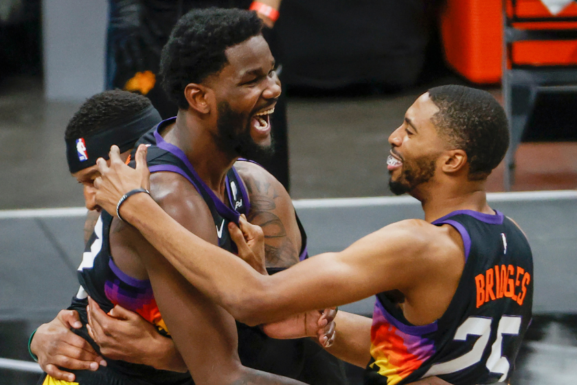  Deandre Ayton #22 of the Phoenix Suns and Mikal Bridges #25 celebrate defeating the LA Clippers 104-103 in game two of the NBA Western Conference finals