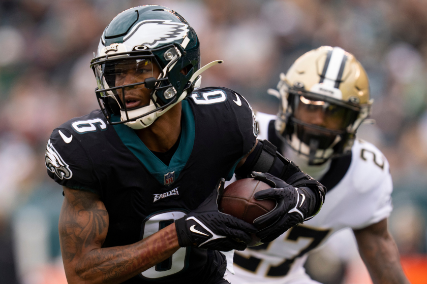 DeVonta Smith #6 of the Philadelphia Eagles catches a pass and runs with the ball against Malcolm Jenkins #27 of the New Orleans Saints