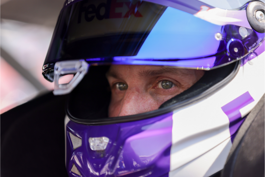 Denny Hamlin sits in his car during practice for the 2022 Auto Trader EchoPark Automotive 500 at Texas Motor Speedway