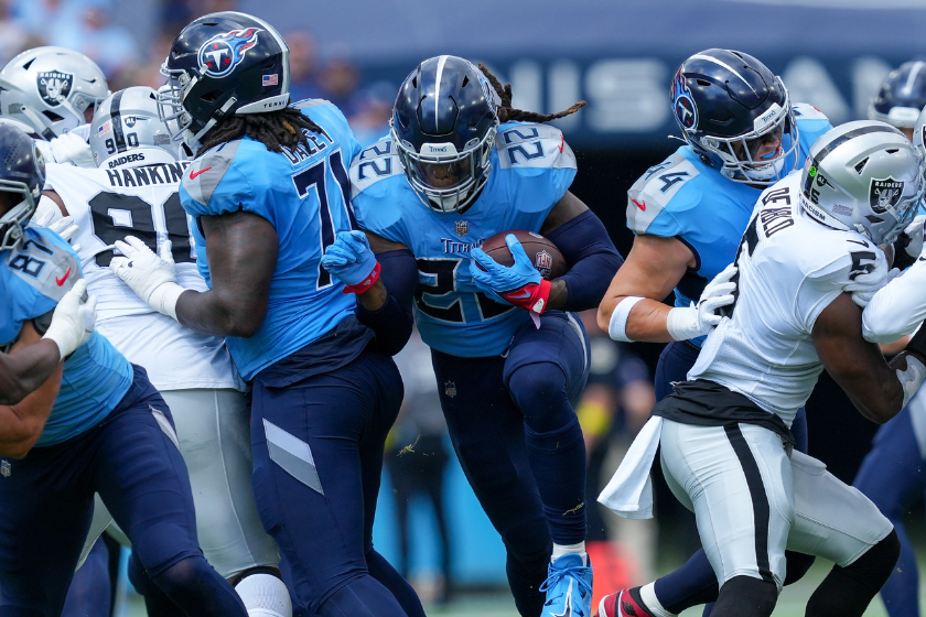 Derrick Henry #22 of the Tennessee Titans runs with the ball in the first quarter against the Las Vegas Raiders