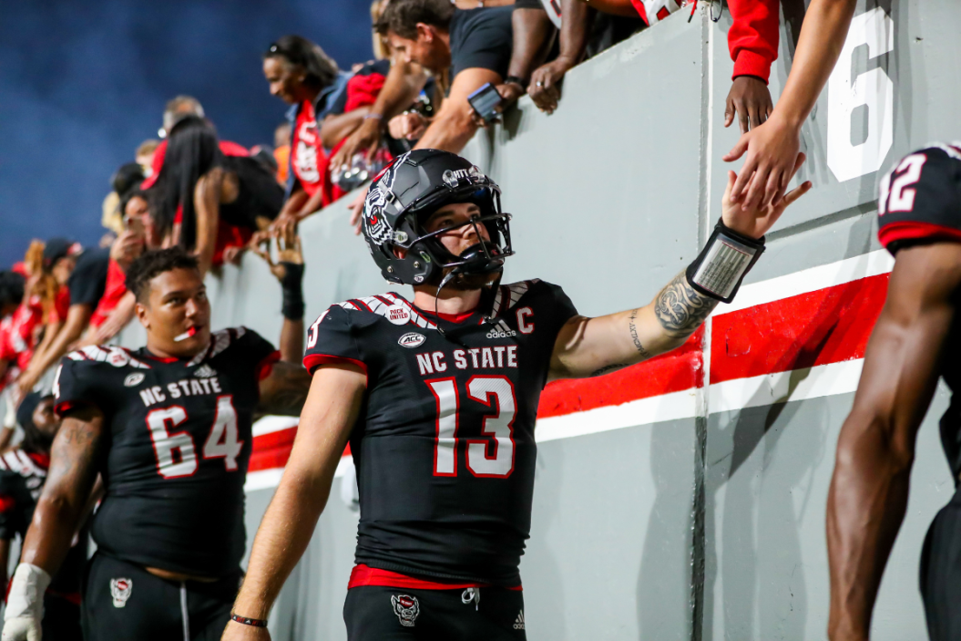 Devin Leary greets the crowd after NC State's win over Texas Tech.