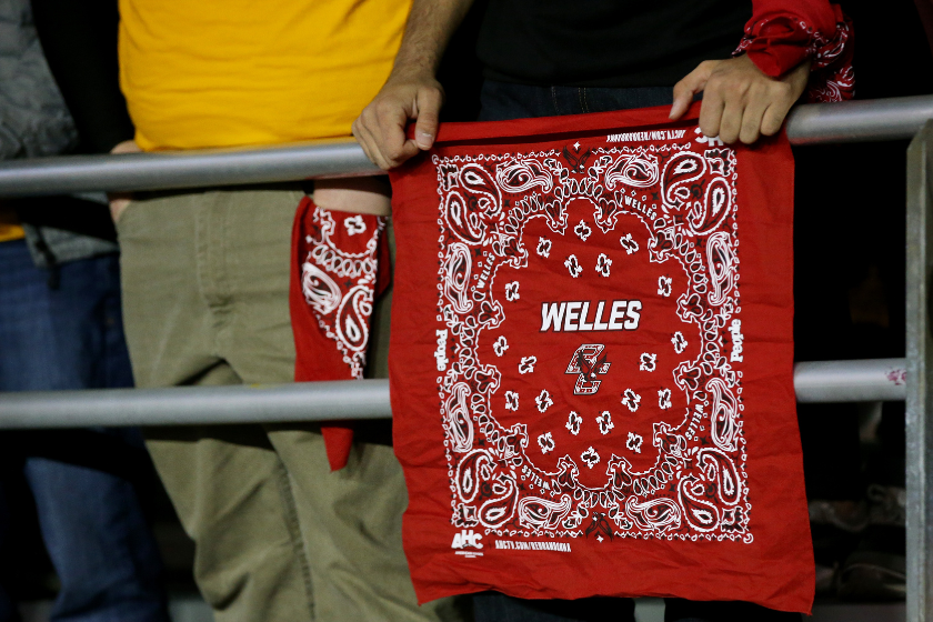 A Boston College fan honors Welles Crowther with a red bandana.