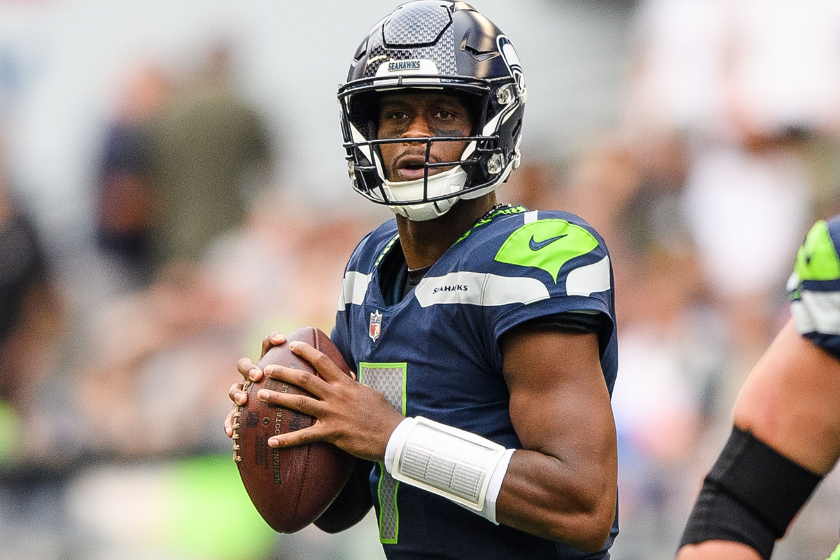 Geno Smith #7 of the Seattle Seahawks looks on during the first half of the preseason game