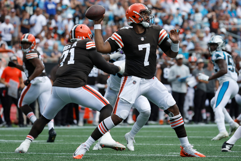 Quarterback Jacoby Brissett #7 of the Cleveland Browns looks to pass during the first half of their NFL game against the Carolina Panthers