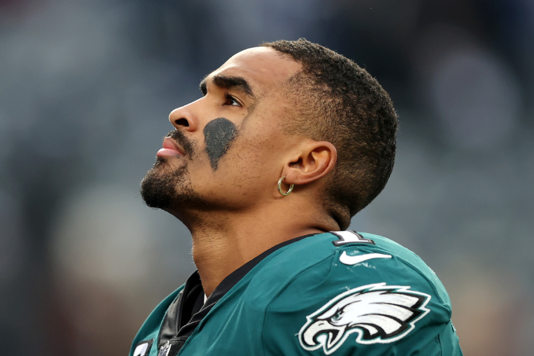 Jalen Hurts #1 of the Philadelphia Eagles looks on as he walks off the field after his team's loss against the New York Giants