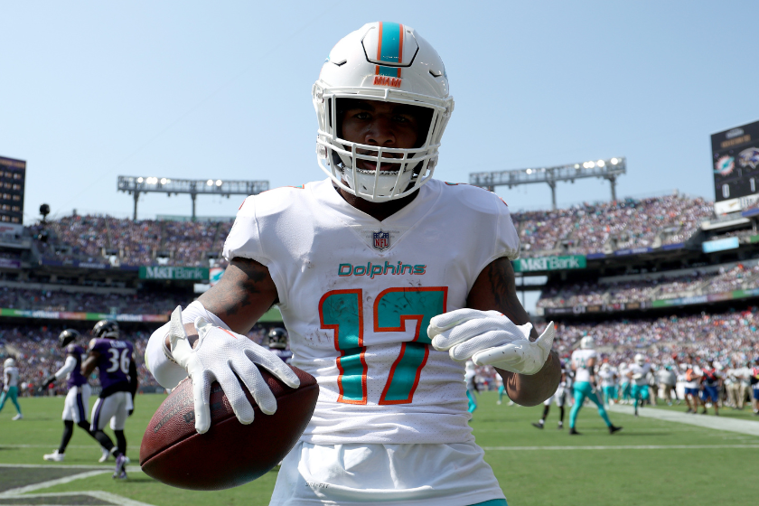 Miami Dolphins wide receiver Jaylen Waddle (17) warms up on the field  before an NFL football game against the Buffalo Bills, Sunday, Sept. 19,  2021, in Miami Gardens, Fla. (AP Photo/Doug Murray