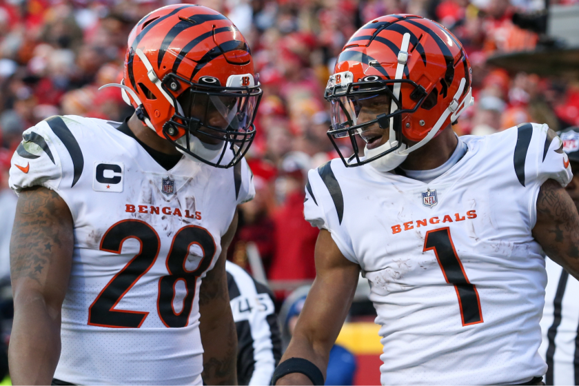 Cincinnati Bengals wide receiver Ja'Marr Chase (1) celebrates with running back Joe Mixon (28) after a 2-yard touchdown reception in the third quarter of the AFC Championship game 