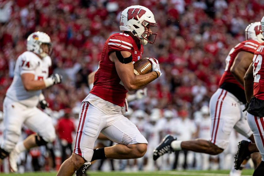 Safety John Torchio (15) returns an interception 100 yards for a pick 6 touchdown durning a college football game between the Illinois State Redbirds and the Wisconsin Badgers 