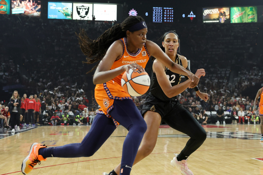 Jonquel Jones #35 of the Connecticut Sun drives against A'ja Wilson #22 of the Las Vegas Aces in the first quarter of Game Two of the 2022 WNBA Playoffs finals at Michelob ULTRA Arena