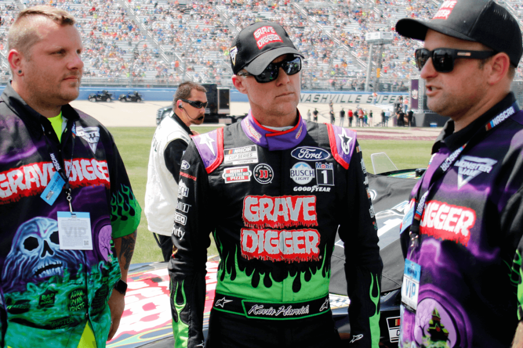 Kevin Harvick with team members of Grave Digger monster truck team during the running of the 2021 Ally 400 at Nashville Superspeedway