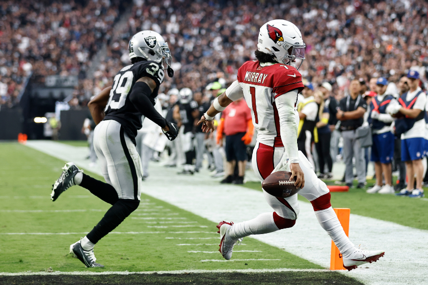 Kyler Murray #1 of the Arizona Cardinals runs for a two-point conversion against Nate Hobbs #39 of the Las Vegas Raiders during the second half at Allegiant Stadium