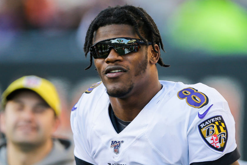 Lamar Jackson #8 of the Baltimore Ravens stands on the sideline during the game against the Cincinnati Bengals