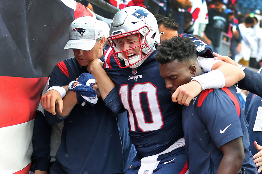 New England Patriots quarterback Mac Jones was howling in pain as he was helped off the field and into the locker room after being injured