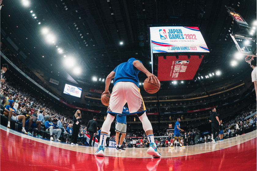 Steph Curry warms up before a preseason game against the Washington Wizards in Japan.
