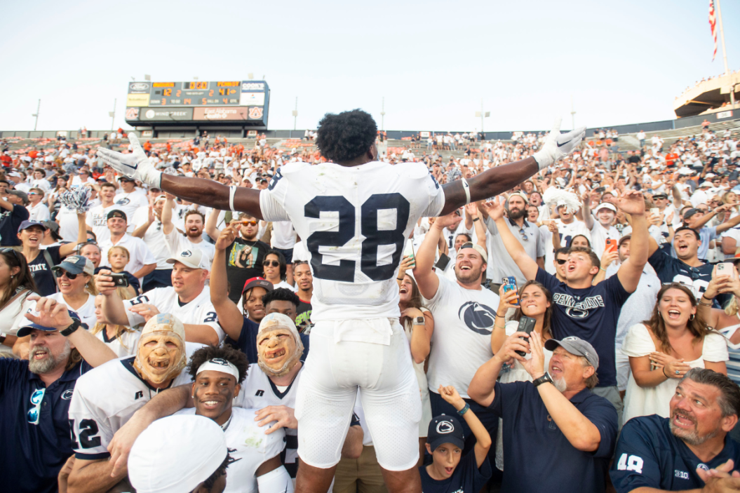 Defensive tackle Zane Durant #28 of the Penn State Nittany Lions celebrates with fans after defeating the Auburn Tigers at Jordan-Hare Stadium